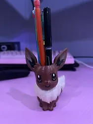 3D printed and hand painted Eevee small desk pencil cup. Printed with PLA+. You get the exact item in the photos....