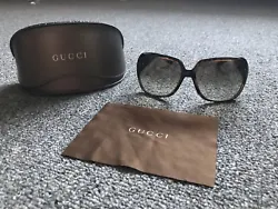 Lightly used Gucci Sunglasses. Case has a few scratches.