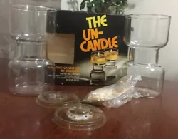 Vintage 1970s The Un-Candle by Corning. Clear glass cylinders with wicks and wick holders create floating candle...