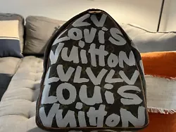 Louis Vuitton Keepall 50 Graffiti Bag. RARE find! Excellent condition with original dust cover. This bag is the...