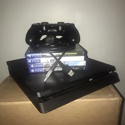 Ps4 Slim 500 gb with controller and gamesGames:Uncharted 4Trials FusionUFCCall of Duty: Infinite Warfare