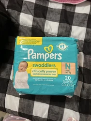 Pampers Swaddlers Size NB - 20 Diapers. Condition is New. Shipped with USPS Priority Mail.