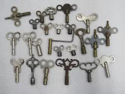 24 Antique Clock Keys.