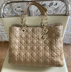I am downsizing my belongings and it is your chance to get Authentic Dior Tote Bag in classic Dior Cannage Quilted...