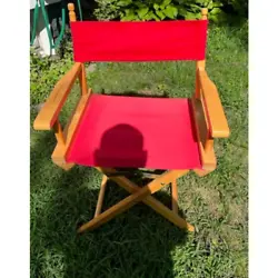 Red directors chair, cloth has wear. 17