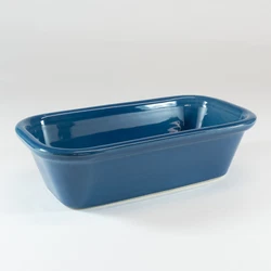 Crate & Barrel Loaf Pan. Glazed cobalt blue stoneware with classic rounded edges. Like New Condition.