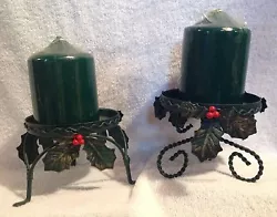 They have a rustic gold brushed red berry and holly design. They can hold a candle up to 4