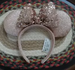 They are a sparkly rose-gold color and are a one size fits all.