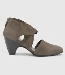 Elevate your style with these stunning Eileen Fisher Mary Twist suede pumps. The taupe color and twist design on the...