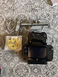 Experience endless gaming fun with this Nintendo Wii U 32GB Console Deluxe Set - Black. The console is equipped with...