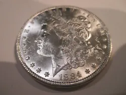 1884 Morgan Silver Dollar in Choice BU condition.