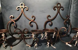 Two wall candle holders/sconces. Antique bronze gold color iron. Each sconce is 14