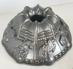 Nordic Ware 10 Cup Carousel/Merry Go Round Bundt Cake Pan. Heavy Cast Aluminum.  Pre-owned.   Good used condition. ...