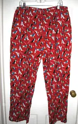 Lightweight 100% polyester fleece lining. Red with a Dog Print all over Side Pockets, Drawstring. Comfortable elastic...