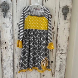 Pure cotton fabric that stretches. Bell sleeves. Dress falls to a loose a-line. Square neckline. Ruffle trim. Colorful...