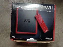 Nintendo Wii mini Console - Rouge. En très bon état.