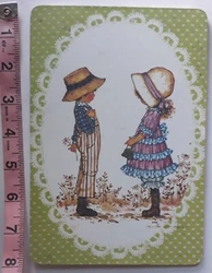 vintage formica 1970s style boy and girl table side hot pad trivet