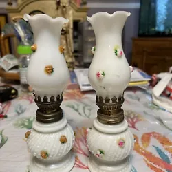This vintage milk glass hurricane lamp is a beautiful addition to any collection. With a white color and standing at 8...