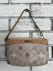 COACH Signature Wristlet C Logo Multicolor Floral Pouch. Very good condition