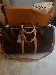 Louis Vuitton Monogram Keepall Bandouliere 55 Duffle Bag w/ Strap, Lock, Box and Dust bag included.  This bag is in...