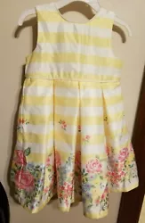Size 24 month. Beautiful little dress would be wonderful for Easter or for Spring. This dress was laundered worn then...