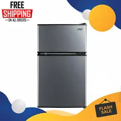 Introducing the Arctic King 3.2 Cu. Feet Two-Door Mini Fridge with Freezer in Stainless Steel - a versatile and compact...