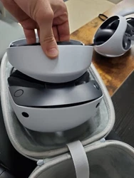 Used Sony PSVR 2 Headset with Controllers and Charging Station. Barely used and works great. Carrying case comes with...