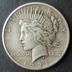 1921 $1 Peace Silver Dollar. Circulated. See pics. Items pictured are the exact items up for sale and are the exact...