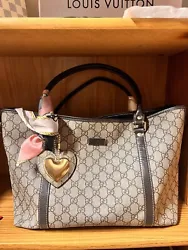 Gucci Large Tote Authentic, this is the purse I used everyday as a diaper bag, but I’m selling it now because she is...