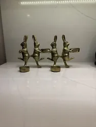 Add a touch of charm to your home with this lovely gold metal candelabra featuring a unique rabbit/hare design. Perfect...