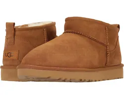 Leather heel label with embossed UGG® logo and polyester bindings. Treadlite by UGG™ outsole provides increased...