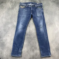 Up for sale is a used-Diesel Jeans Means 36x32 Blue Thavar XP Stretch Slim Skinny Denim Distressed———Stains on...