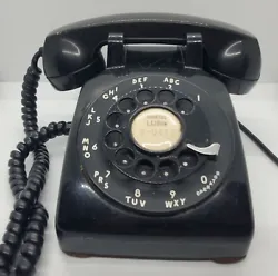 ROTARY PHONE. BELL SYSTEMS. GOOD SHAPE. THERE IS AN OLD SCRATCH IN IT IN THE FORM OF NICKY. THESE ARE HARD TO FIND....
