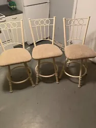 metal swivel bar chairs set 3. Full 360 swivel. Chairs are quite solid and in great shape.