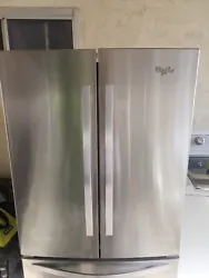 This Whirlpool freestanding refrigerator is a stylish addition to any kitchen. The French door design and stainless...