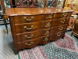 Dark cherry color. Circa 1940. Dresser has oak drawers with dovetails. Minor wear from use. Dresser is 62