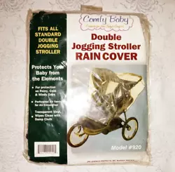 From auction. New in package. Clear rain and wind shield for your double jogging stroller to protect your 2 little...