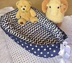 Babynest for a Newborn baby boy. Baby nests/beds are known to help babies feel safe and secure while they are sleeping....
