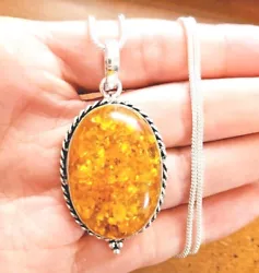 Beautiful amber yellow and green tones. Pendant is 2