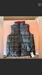 Polo Ralph Lauren puffer vest. This is reversible one side is blue green yellow and red plaid and the other side is...