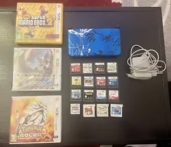 Lot Console Nintendo 3DS XL Pokémon Xerneas Yveltal BLUE + 19 Jeux. Le lot comprend la console en parfait état de...