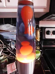 OFFERED UP FOR SALE IS A GORGEOUS ORANGE BLUE LAVA LAMP IN EXCELLENT WORKING AND COSMETIC CONDITION. THE LAMP STANDS 16...