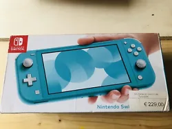 Nintendo Switch Lite Console Portable - Turquoise. Chargeur inclu.