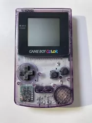 Game boy color Violette Transparente. Il manque le cache des piles mais fonctionne correctement