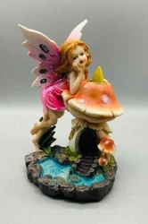 Fairy Back Flow Incense Burner is made of cold cast resin. Beautiful details and colors throughout this special piece.
