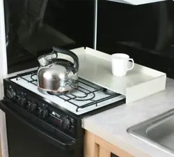 This White Universal Fit Stove Top Cover protects and hides burners while adding counter space in your RV. Cover acts...