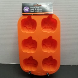 Wilton Silicone Jack-o-lantern Pumpkin For Baking And Molding. 6 unique Pumpkin Faces. Great for making large peanut...