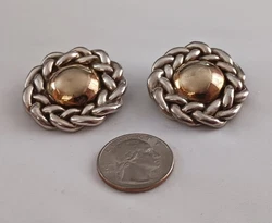 The intricate braid sun design adds a unique touch to your style, making you stand out from the crowd. The earrings...