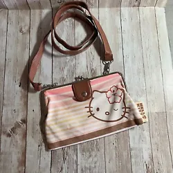 Vintage Sanrio Hello Kitty Clutch Purse - Pink, Cream & Tan. Adjustable strap, gently used. Comes as is.