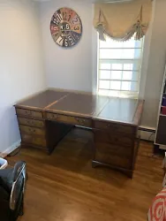 19th Century English Antique Partners Desk. 3 Piece Leather Top. Brass locks and handles. Measures 31”...